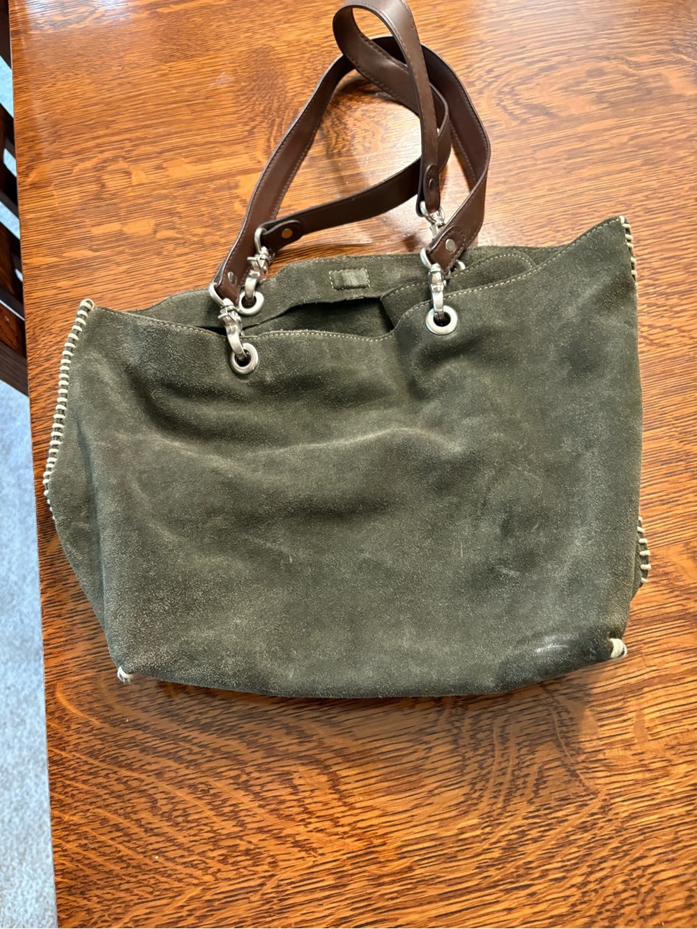 Green suede handbag